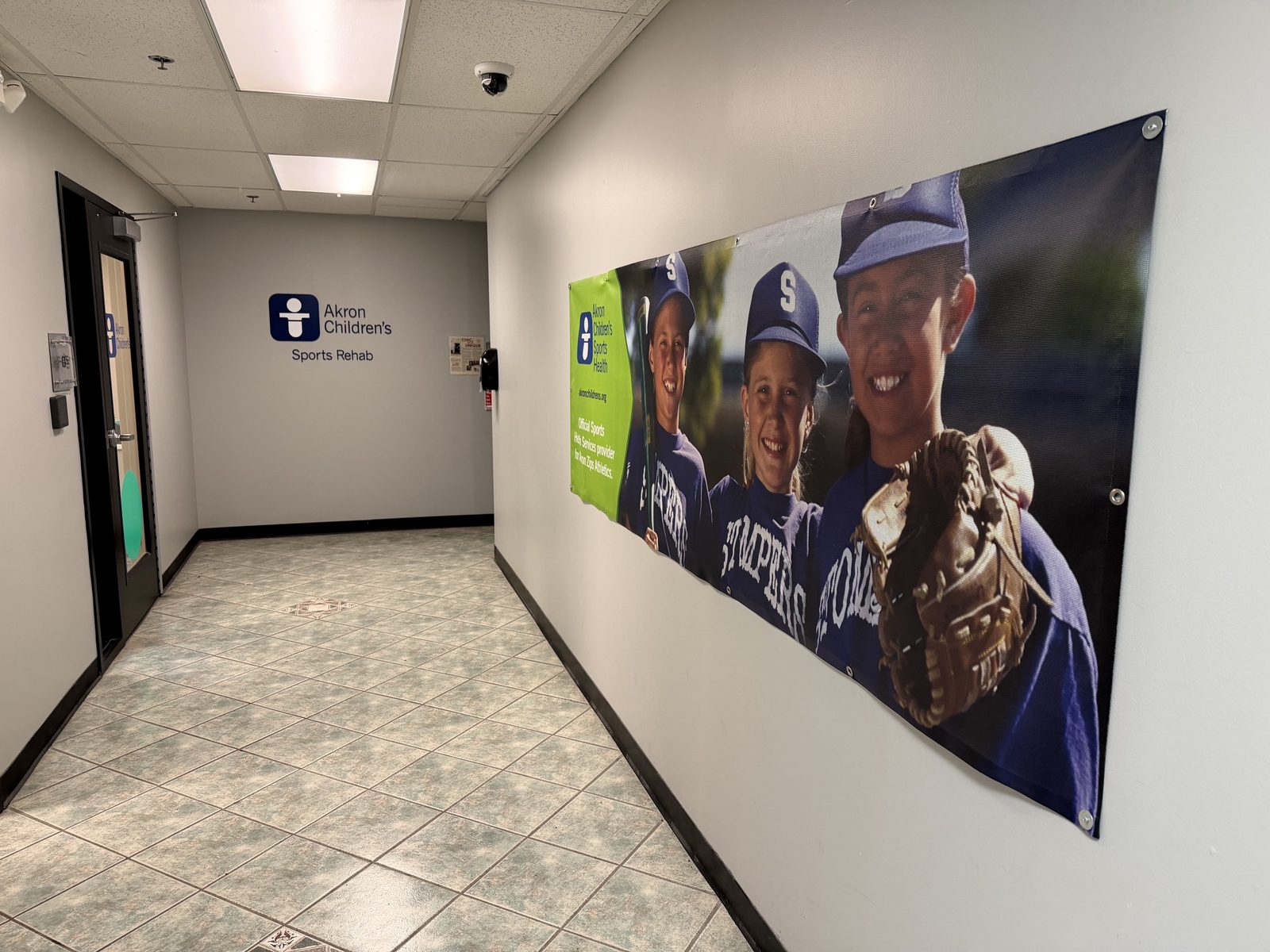 Sponsor banner in a high traffic hallway at Pinnacle Sports